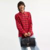 Bolso Compass 35 de Disney x Coach con Mickey Mouse