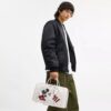 Bolso Compass 35 de Disney x Coach con Mickey Mouse