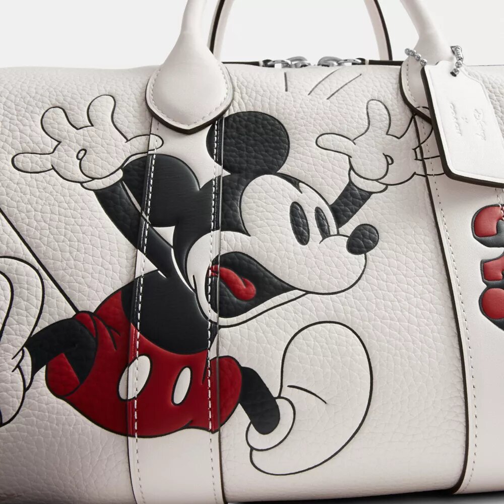 Bolso Compass 35 de Disney x Coach con Mickey Mouse
