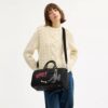 Bolso Compass 35 de Disney X Coach con Pluto