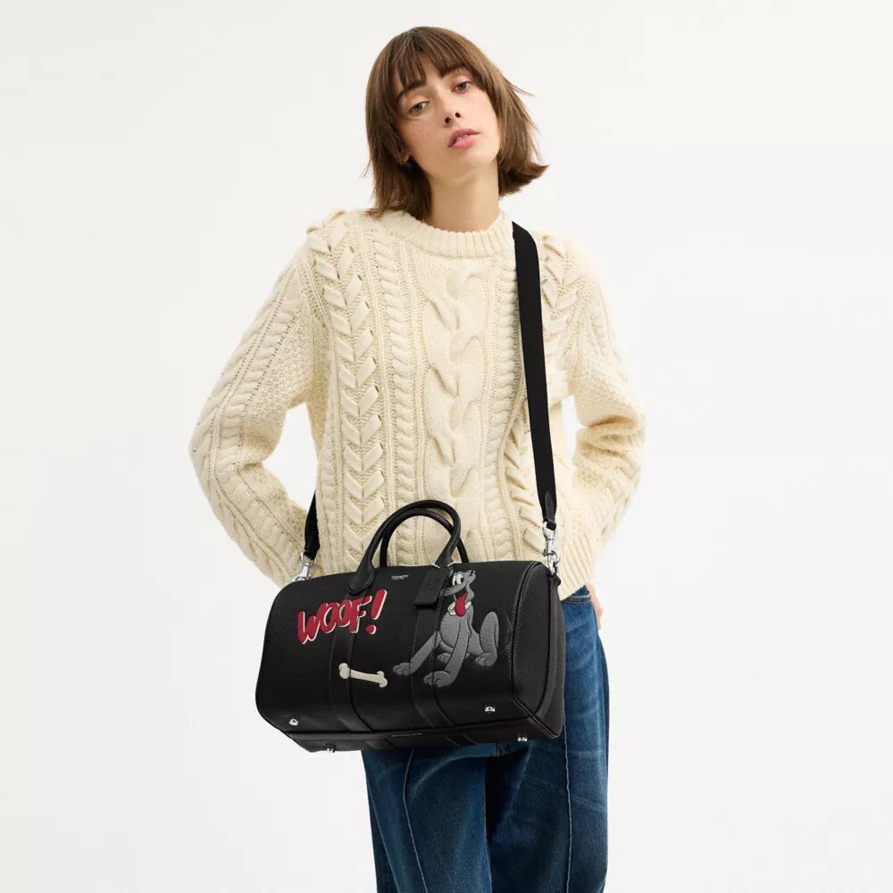 Bolso Compass 35 de Disney X Coach con Pluto
