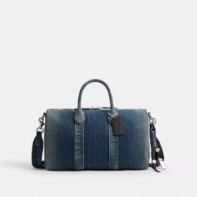 Bolso Compass 35 en denim de algodón regenerativo con Charms