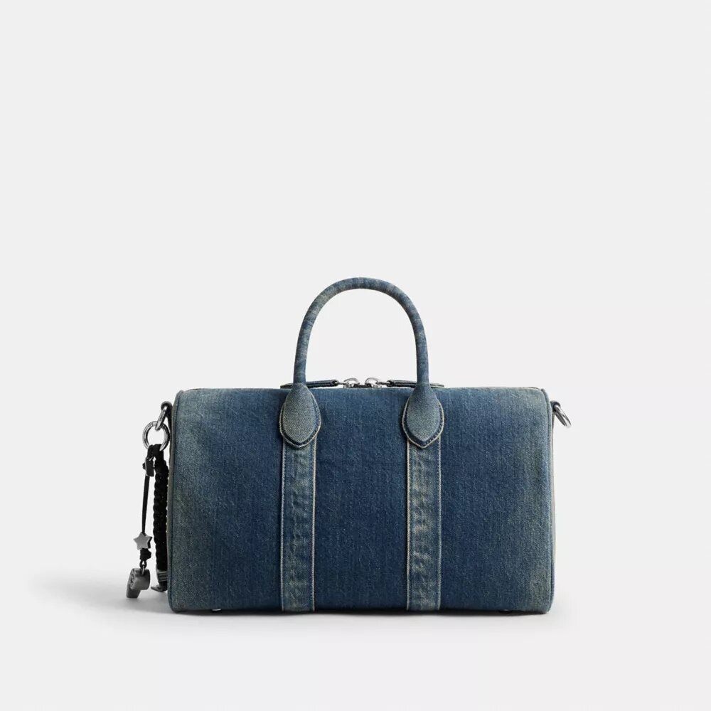Bolso Compass 35 en denim de algodón regenerativo con Charms