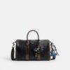 Bolso Compass 35 en piel desgastada con Charms