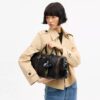 Bolso Compass 35 en piel desgastada con Charms