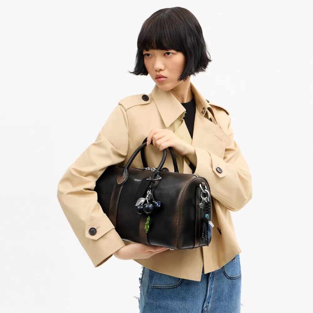 Bolso Compass 35 en piel desgastada con Charms