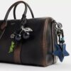 Bolso Compass 35 en piel desgastada con Charms