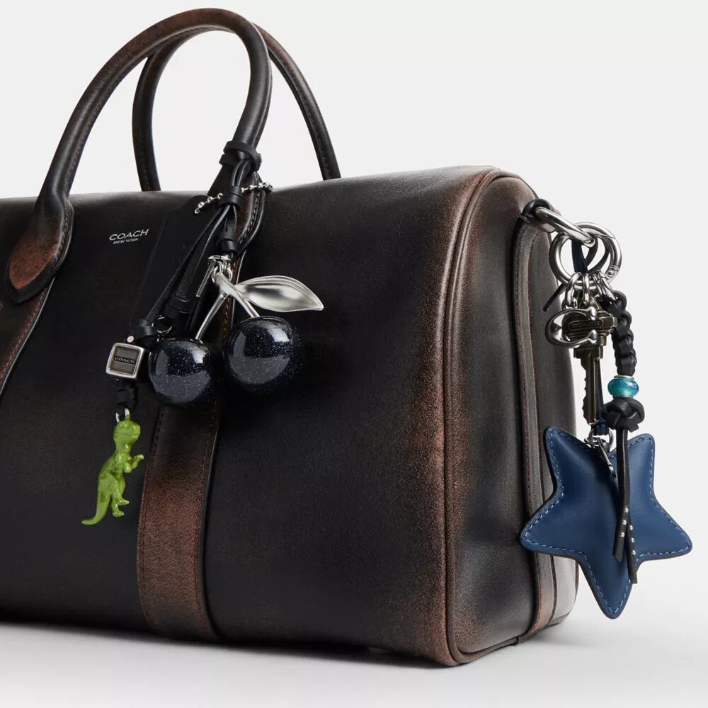 Bolso Compass 35 en piel desgastada con Charms