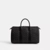 Bolso Compass 35 en Signature Canvas