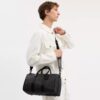 Bolso Compass 35 en Signature Canvas