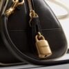 Bolso con asa superior tipo «Bowling»