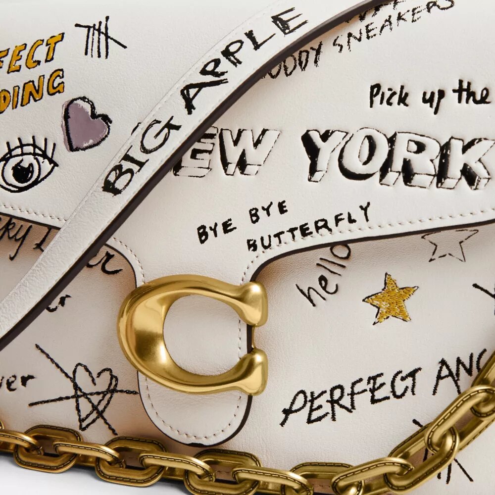 Bolso de hombro con lengüeta de cadena y estampado «Sketch»