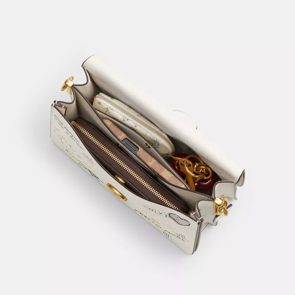 Bolso de hombro con lengüeta de cadena y estampado «Sketch»