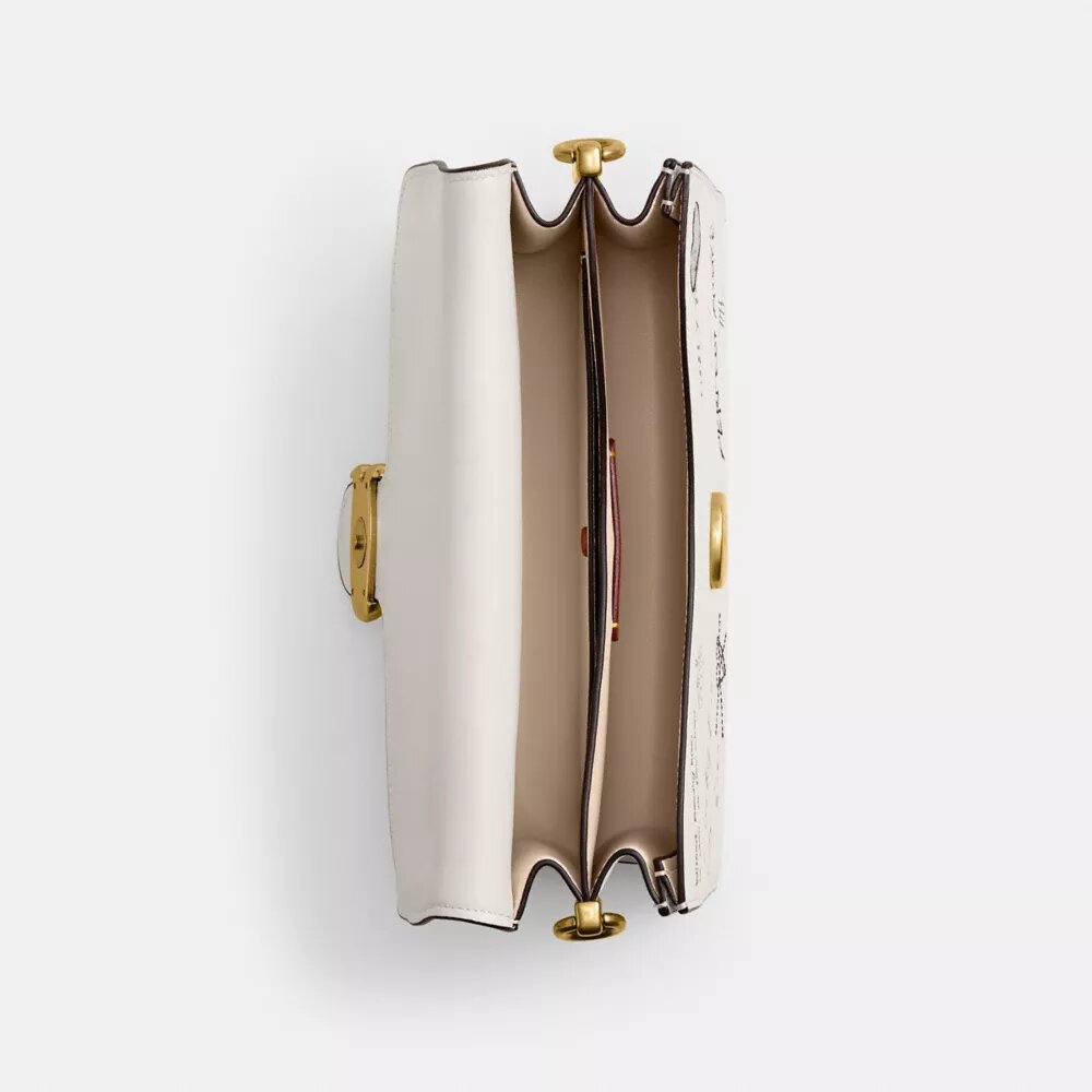 Bolso de hombro con lengüeta de cadena y estampado «Sketch»
