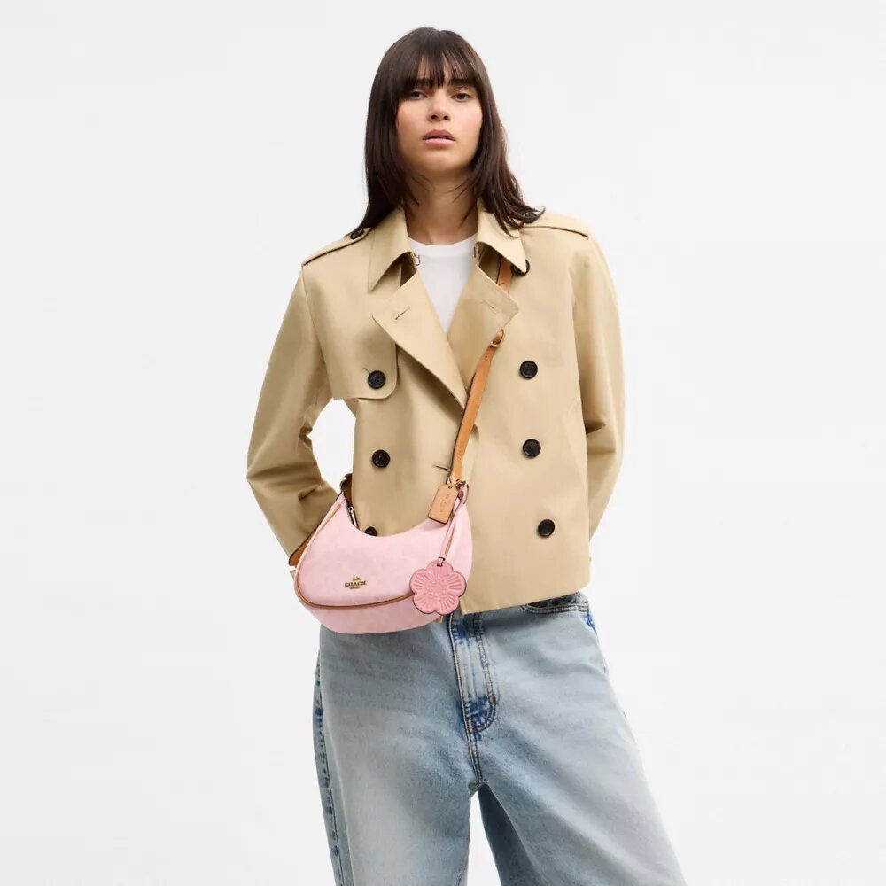 Bolso de hombro Emily en Signature Canvas con Charms