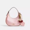 Bolso de hombro Emily en Signature Canvas con Charms