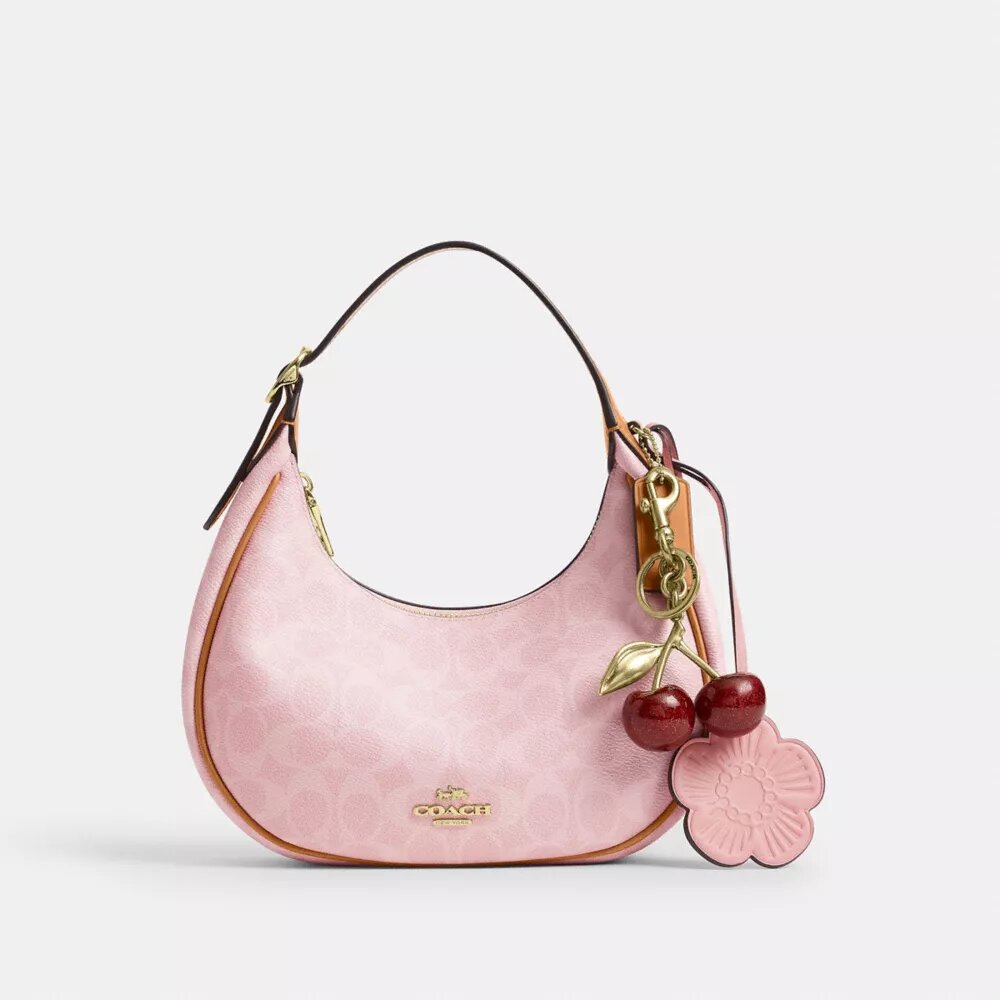 Bolso de hombro Emily en Signature Canvas con Charms