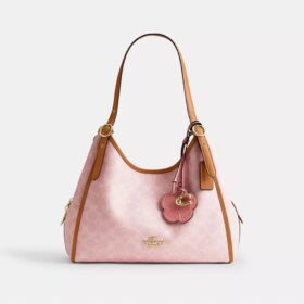 Bolso de hombro Erin en Signature Canvas con Charms