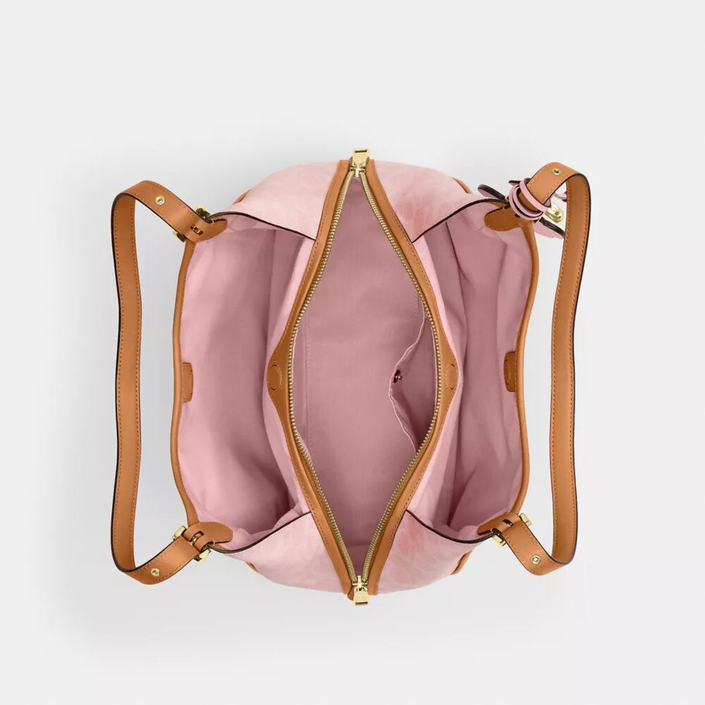 Bolso de hombro Erin en Signature Canvas con Charms