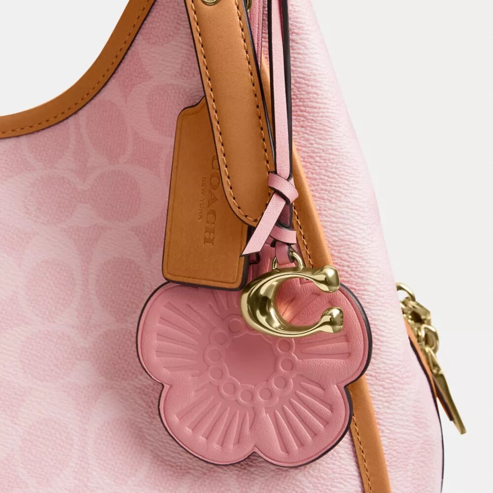 Bolso de hombro Erin en Signature Canvas con Charms