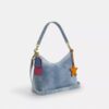 Bolso de hombro Laurel en denim desgastado con Charms