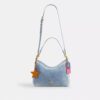 Bolso de hombro Laurel en denim desgastado con Charms