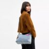 Bolso de hombro Laurel en denim desgastado con Charms