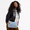Bolso de hombro Laurel en denim desgastado con Charms
