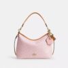 Bolso de hombro Laurel en Signature Canvas con Charms