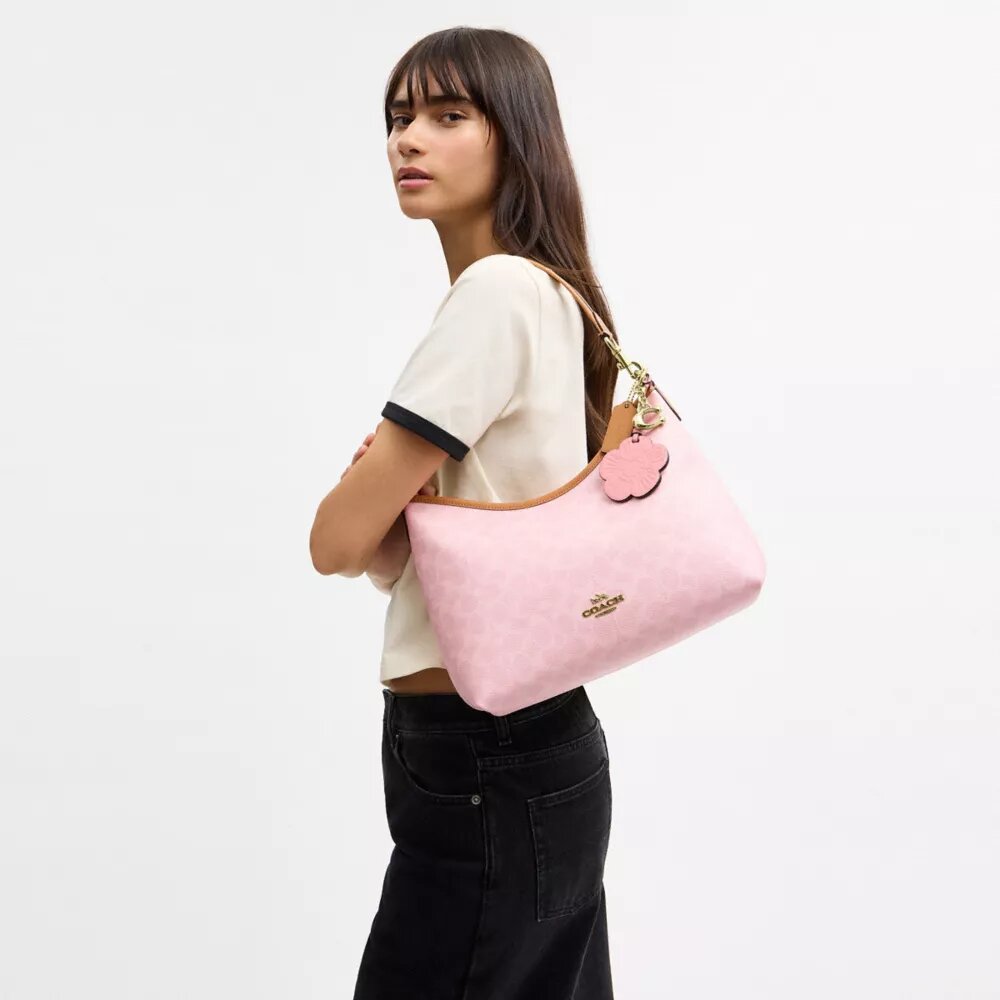 Bolso de hombro Laurel en Signature Canvas con Charms
