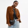 Bolso de hombro Teri en piel exclusiva con colgante de corazón