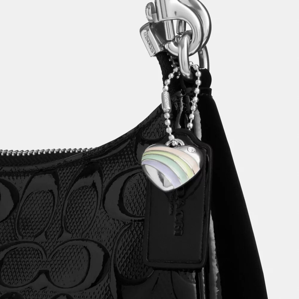 Bolso de hombro Teri en piel exclusiva con colgante de corazón
