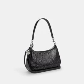 Bolso de hombro Teri en piel exclusiva con colgante de corazón