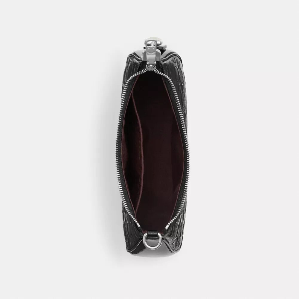 Bolso de hombro Teri en piel exclusiva con colgante de corazón
