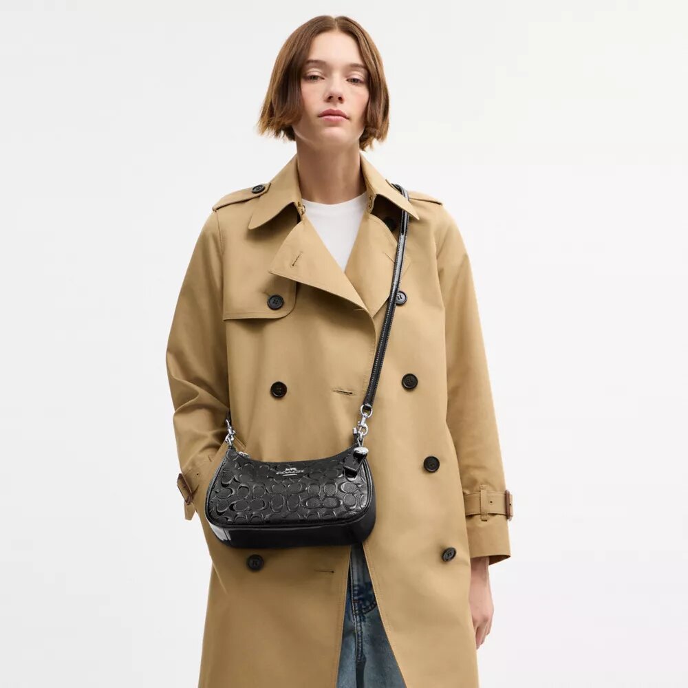 Bolso de hombro Teri en piel exclusiva con colgante de corazón
