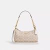 Bolso de hombro Teri en Signature Canvas