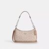 Bolso de hombro Teri en Signature Canvas