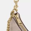 Bolso de hombro Teri en Signature Canvas