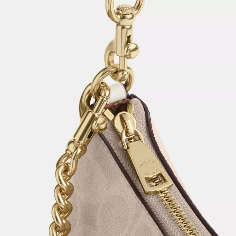 Bolso de hombro Teri en Signature Canvas
