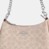Bolso de hombro Teri en Signature Canvas