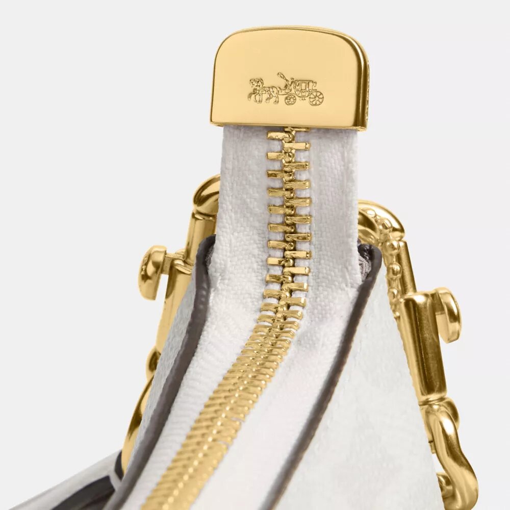 Bolso de hombro Teri en Signature Canvas