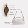 Bolso de hombro Teri en Signature Canvas