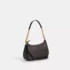 Bolso de hombro Teri en Signature Canvas