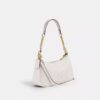Bolso de hombro Teri en Signature Canvas