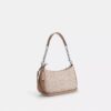 Bolso de hombro Teri en Signature Canvas