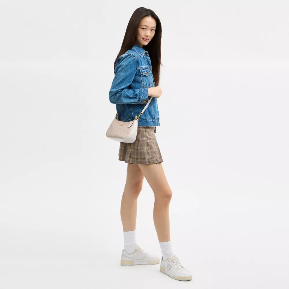 Bolso de hombro Teri en Signature Canvas