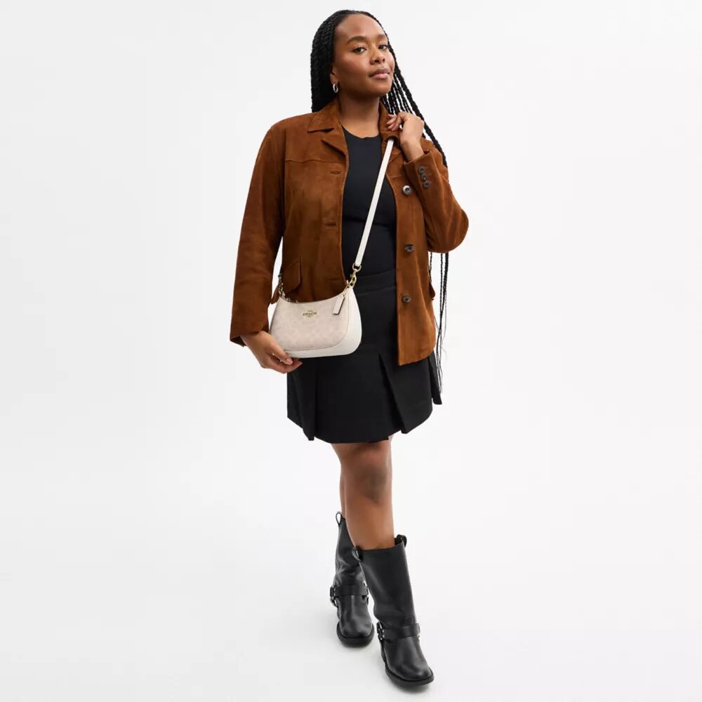 Bolso de hombro Teri en Signature Canvas