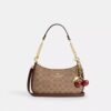 Bolso de hombro Teri en Signature Canvas