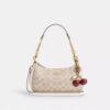 Bolso de hombro Teri en Signature Canvas