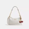 Bolso de hombro Teri en Signature Canvas